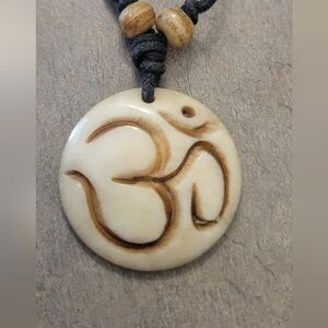 Adjustable Black Cord Necklace with Cream Ohm Pendant